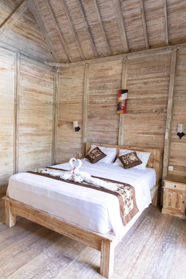 Wisma tamu Coconut Village Redpartner 2*