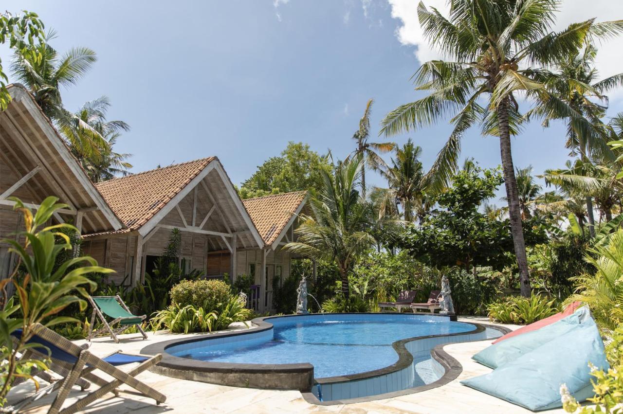 Wisma tamu Coconut Village Redpartner 2*