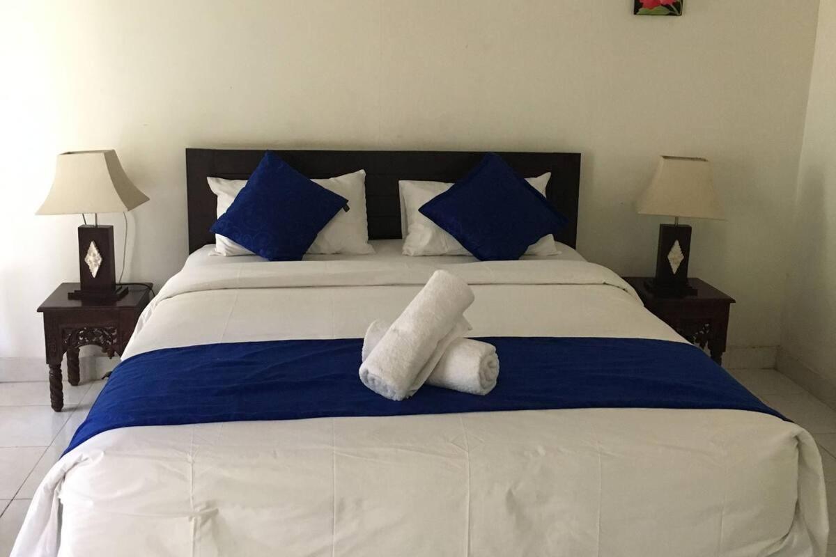 Wisma tamu Coconut Village Redpartner 2*