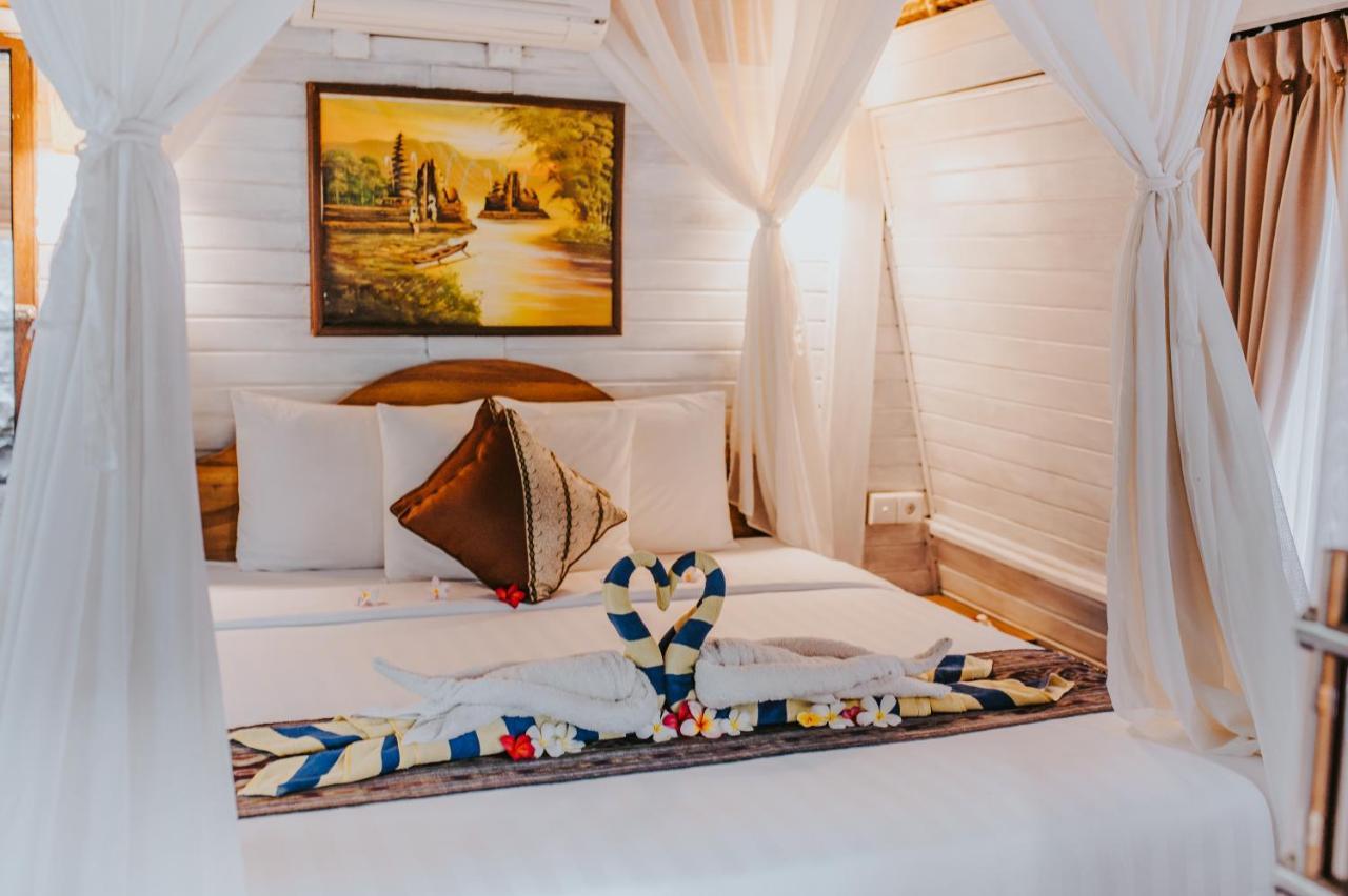 Alam Nusa Huts &