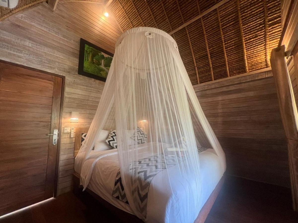 Tempat Tidur & Sarapan Honeybee Huts *