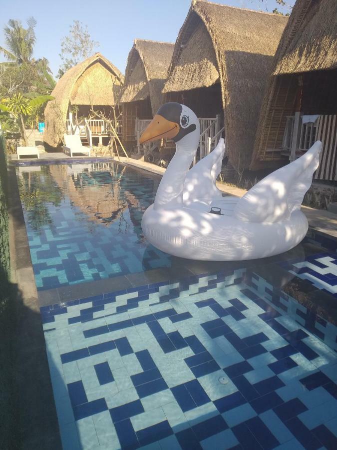 Tempat Tidur & Sarapan Honeybee Huts *
